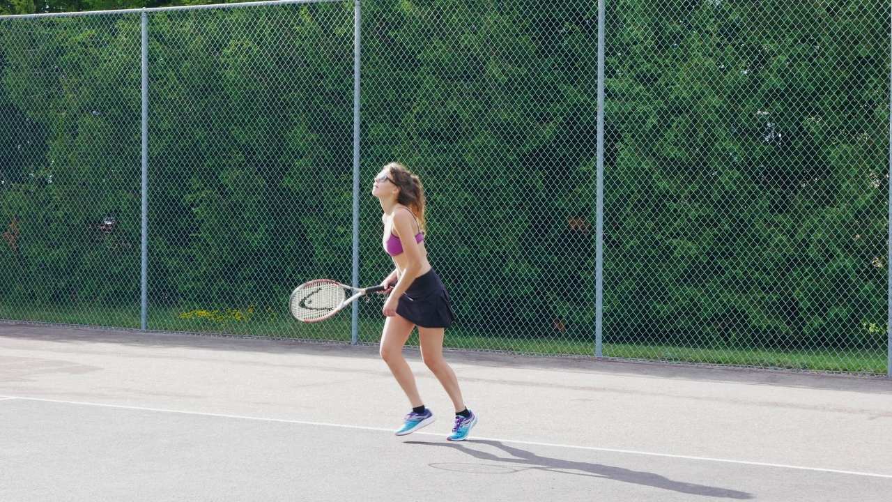 Rozalia training agility and coordination while playing tennis